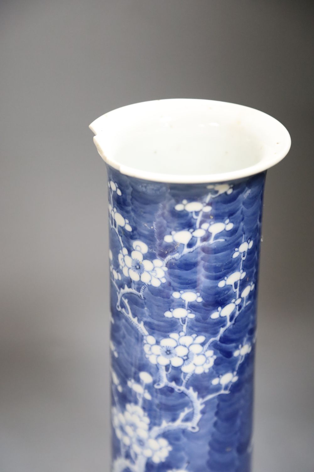 A near pair of Japanese porcelain lidded vases